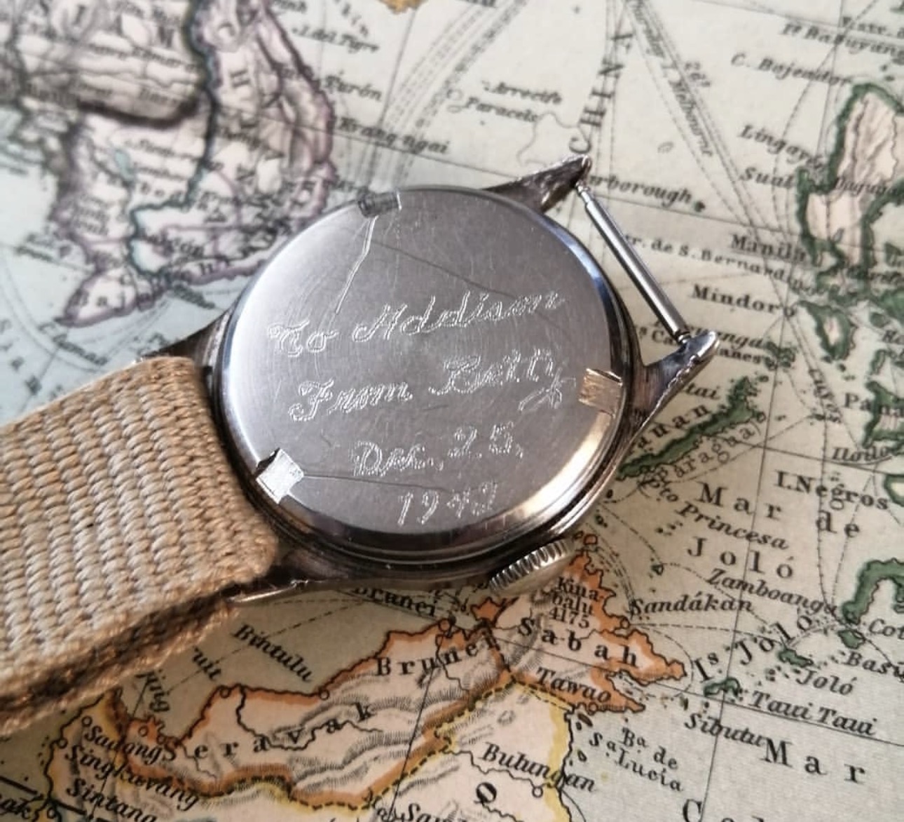 Watch back engraved: To Addison, From Betty, Dec. 25, 1943