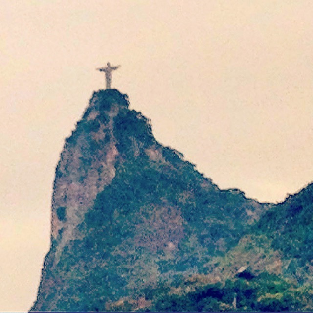 Christ the Redeemer statue distant on Corcovado, heavy grain, bleached sky, Rio de Janeiro